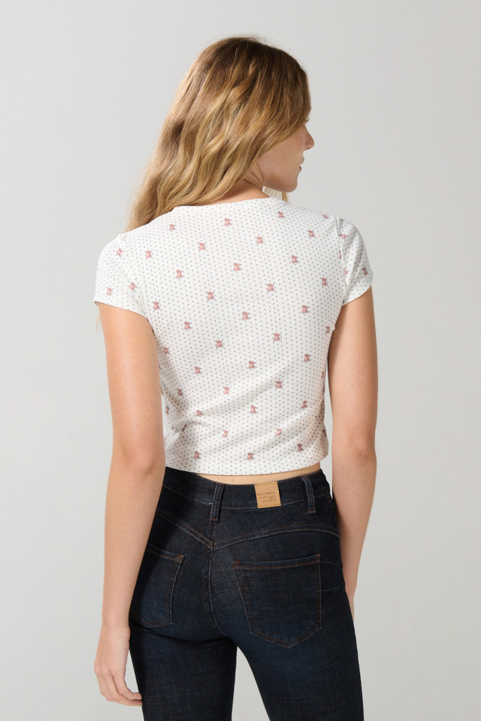 Camiseta unicolor manga corta con diseño de animalitos