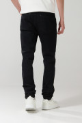 Jean negro skinny con tiro bajo, cremallera y ajuste ceñido