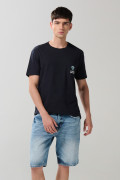 Bermuda en jean slim azul con rotos y desgastes