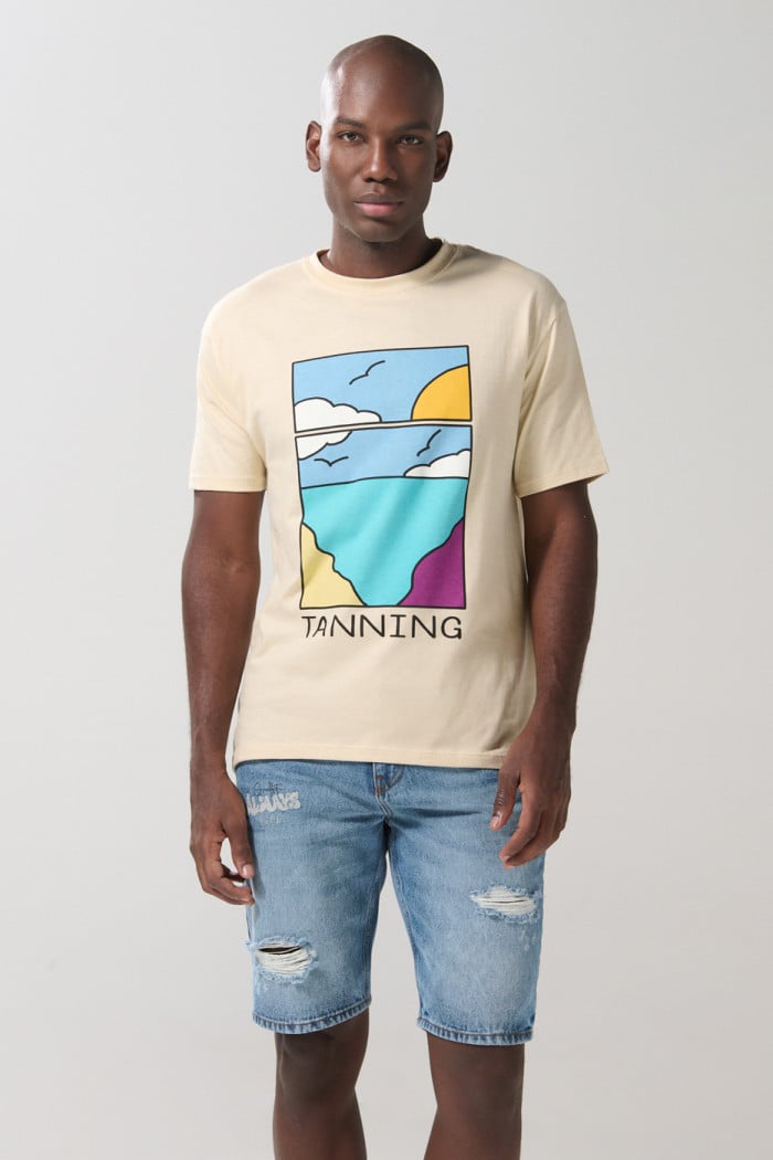 Bermuda slim tiro bajo en jean azul con rotos y diseños