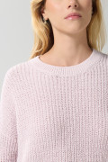 Suéter cuello redondo unicolor en suave tejido