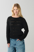 Suéter negro cuello redondo con diseños localizados