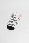 Medias unicolores tobilleras con artes de animal print