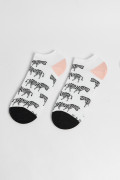 Medias unicolores tobilleras con artes de animal print