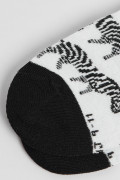 Medias unicolores tobilleras con artes de animal print