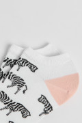 Medias unicolores tobilleras con artes de animal print