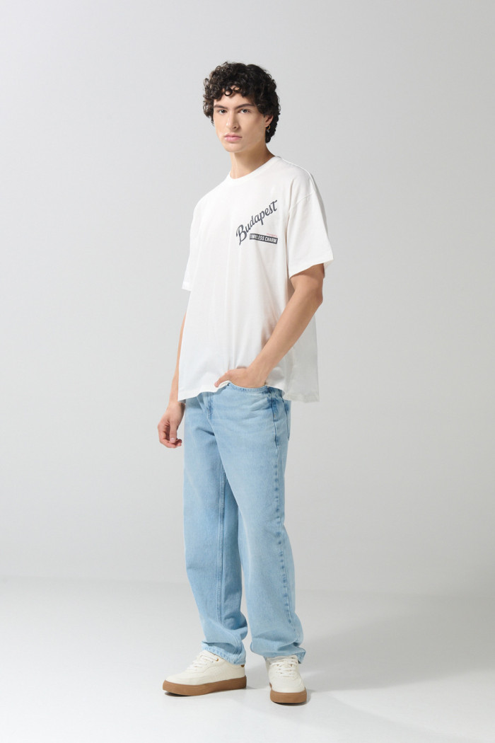 Camiseta crema manga corta oversize con diseños college