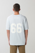 Camiseta oversize azul manga corta con diseños college