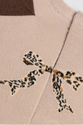Medias kakis tobilleras con moño en animal print