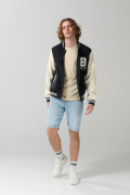 Chaqueta bomber college negra con mangas en contraste
