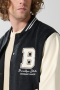 Chaqueta bomber college negra con mangas en contraste