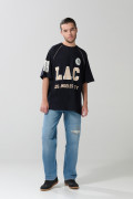 Camiseta azul oversize con arte college y manga ranglan