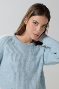 Suéter cuello redondo unicolor con ajuste holgado