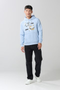 Buzo con capota azul claro y estampado de Tom y Jerry