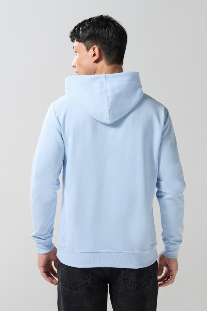 Buzo con capota azul claro y estampado de Tom y Jerry