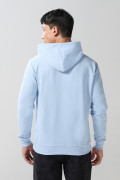 Buzo con capota azul claro y estampado de Tom y Jerry