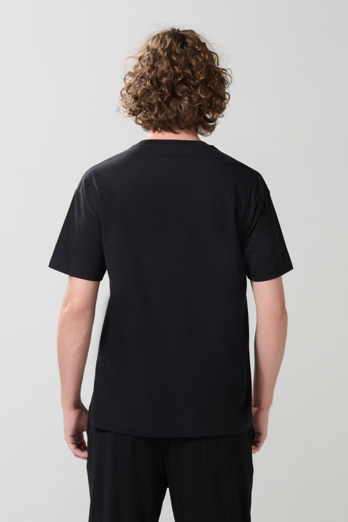 Camiseta de Superman negra con cuello redondo