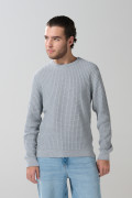 Suéter cuello redondo unicolor con texturas de cuadros