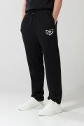 Pantalón negro jogger con diseño de Superman