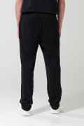 Pantalón negro jogger con diseño de Superman