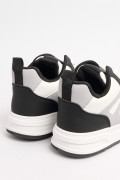 Tenis unicolores casuales de bota con contrastes
