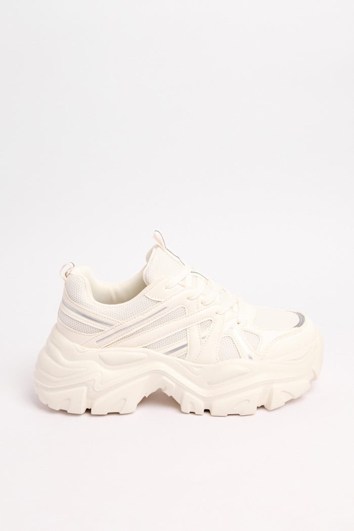 Tenis de plataforma cremas con detalles reflectivos