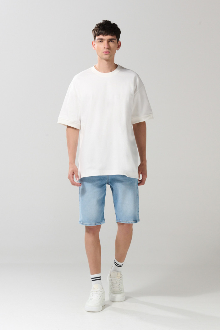 Camiseta oversize en algodón unicolor con manga corta
