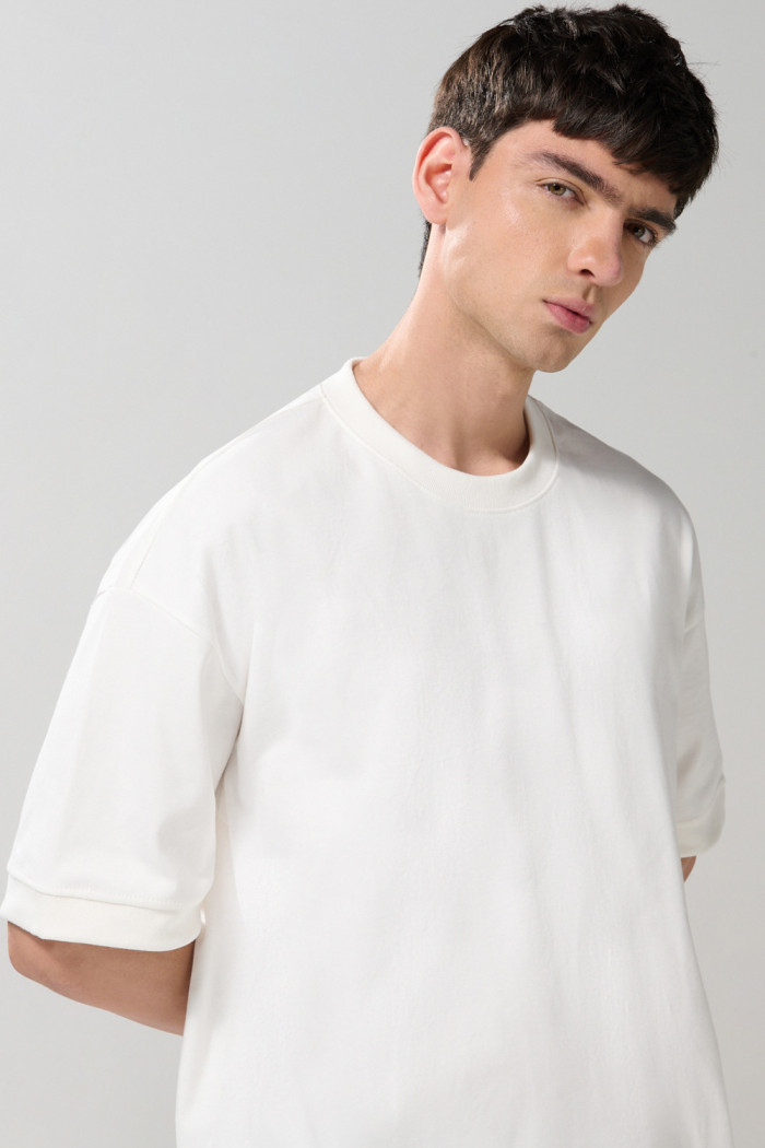 Camiseta oversize en algodón unicolor con manga corta