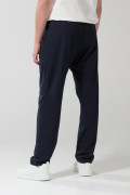 Pantalón jogger azul intenso con diseño de Superman
