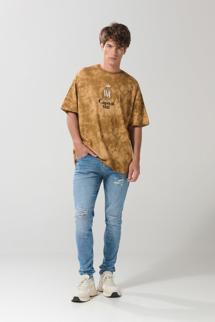 Jean skinny tiro bajo azul claro ajustado con rotos