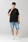 Camiseta oversize negra tie dye con artes de Superman