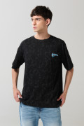 Camiseta oversize negra tie dye con artes de Superman