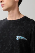 Camiseta oversize negra tie dye con artes de Superman