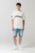 Camiseta crema college oversize con manga ranglan corta
