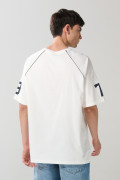 Camiseta crema college oversize con manga ranglan corta
