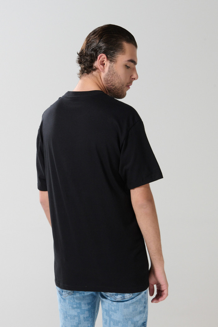 Camiseta hombro rodado en algodón unicolor con manga corta
