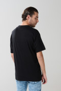 Camiseta hombro rodado en algodón unicolor con manga corta
