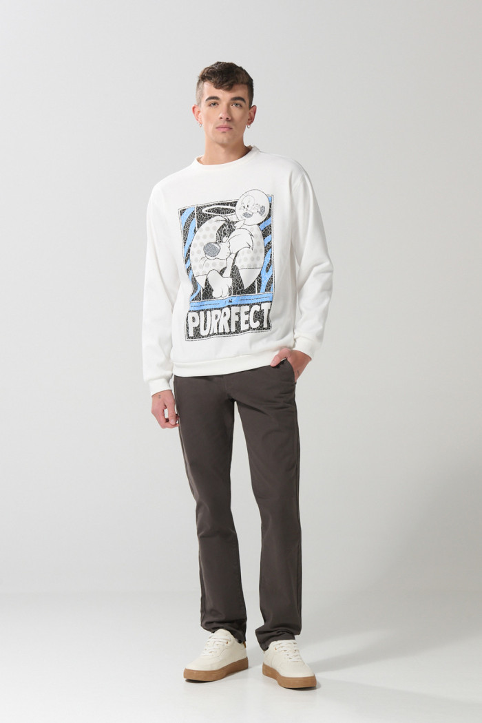 Buzo crema claro cuello redondo con arte de Looney Tunes