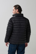 Chaqueta acolchada cuello alto unicolor con cremallera