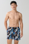 Bermuda negra playera con estampados y tiro bajo