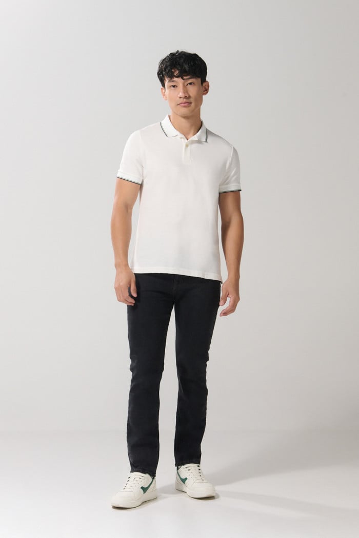 Camiseta polo unicolor con manga corta y aberturas