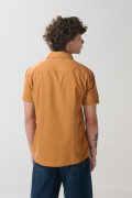 Camisa en algodón unicolor manga corta con cuello sport