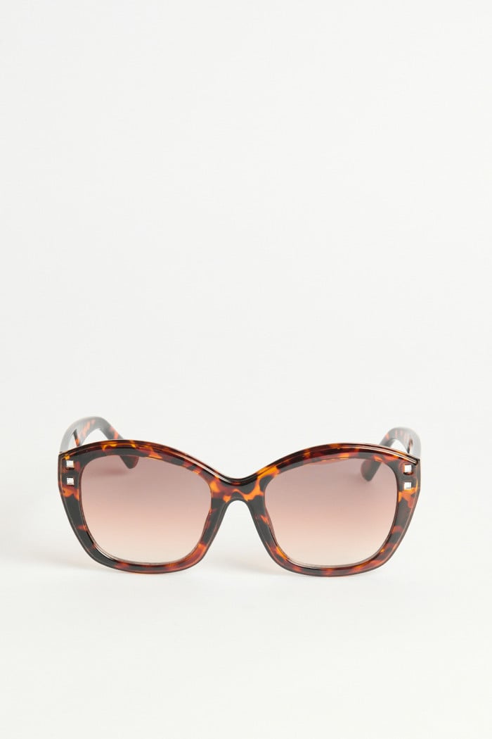 Gafas de sol wayfarer unicolores con lentes oscuros