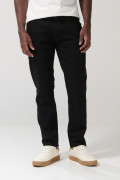 Jean negro slim con cremallera, tiro bajo y ajuste ceñido