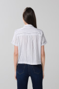 Blusa unicolor manga corta a rayas con bolsillo