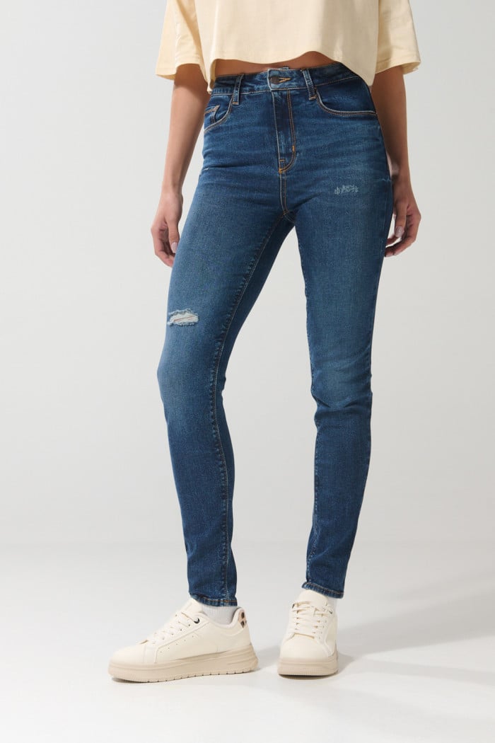 Jean jegging azul oscuro súper tiro alto con rotos en frente