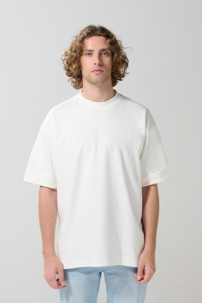 Camiseta oversize manga corta en algodón unicolor