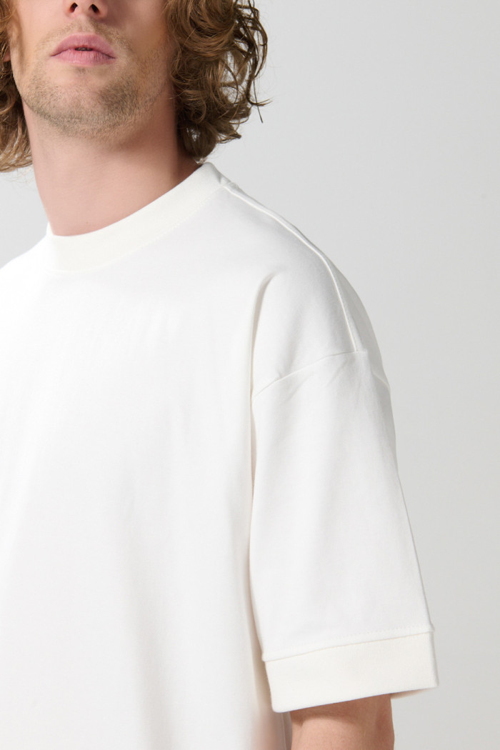 Camiseta oversize manga corta en algodón unicolor