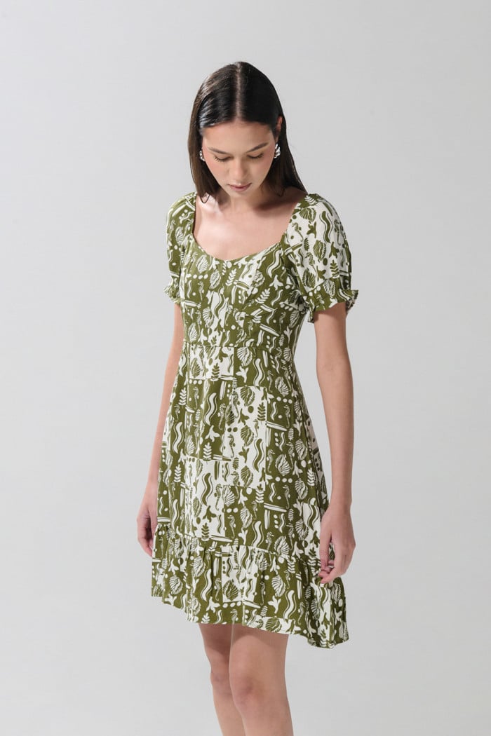 Vestido verde claro corto con diseños estampados