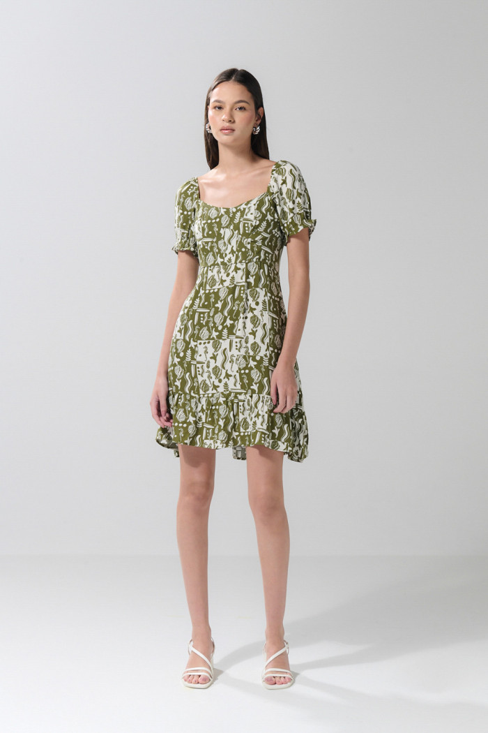 Vestido verde claro corto con diseños estampados